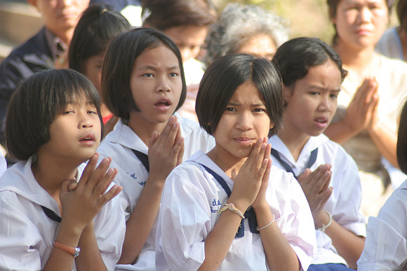Children praying. Thailand